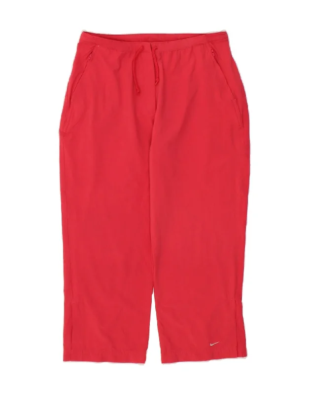 Timeless Outfits NIKE Womens Tracksuit Trousers UK 12 Medium  Pink Nylon